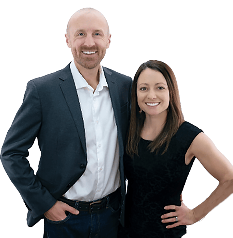 Emily and Adam, a young couple and successful note investors, smiling and standing together outdoors, representing their journey from beginners to earning $6,000 per month with NoteSchool.